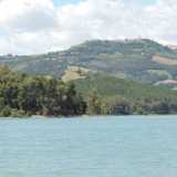 Da qui � possibile anche intravedere la collina sulla quale giace il paese di Miglionico
